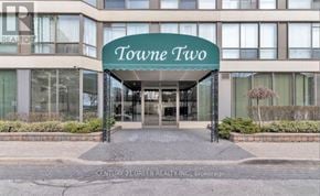 Mississauga (City Centre) condo for rent - The front of a building called Towne Two with a green signboard.