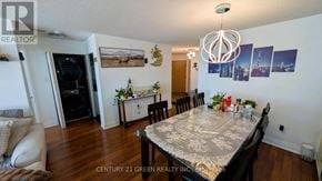 Mississauga (City Centre) condo for rent - A dining room with a table set for six and a couch.