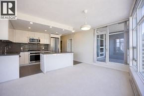 Burnaby apartment for rent - A spacious kitchen with a large island in the middle.