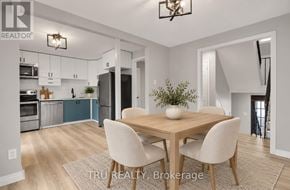 Ottawa apartment for rent - A modern kitchen with a dining table and chairs.