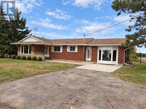 West Lincoln (Bismark/Wellandport) apartment for rent - A house with a driveway in front of it.