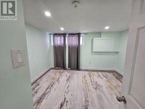 Toronto (Woburn) apartment for rent - A room with a marble floor and a door.