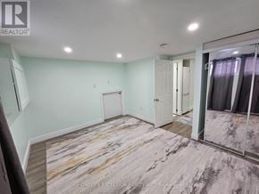 Toronto (Woburn) apartment for rent - A room with a marble floor and a sliding glass door.
