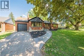 Niagara Falls (Hospital) apartment for rent - A residential property with a driveway and a garage is for sale.