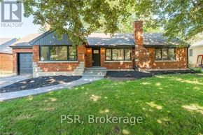 Niagara Falls (Hospital) apartment for rent - A house with the text PSR, Brokerage on the front yard.