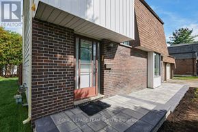 Ottawa apartment for rent - A house with a brick facade and a white roof is shown.