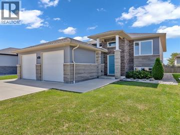 Essex duplex for rent - A modern house with a realtor logo on the image.