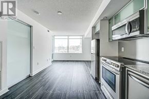 Toronto (Waterfront Communities) condo for rent - A kitchen with a stainless steel oven and microwave.