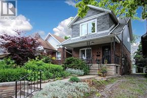Toronto (Woodbine-Lumsden) apartment for rent - A house with a well-maintained garden in front.