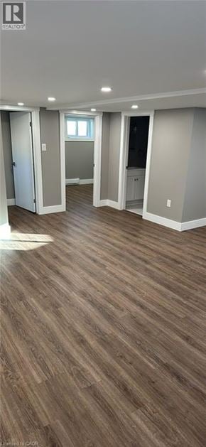 Hamilton apartment for rent - A room with wooden flooring and white walls.