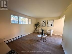 Peterborough (Town Ward 3) apartment for rent - A room with a table and chairs in it.