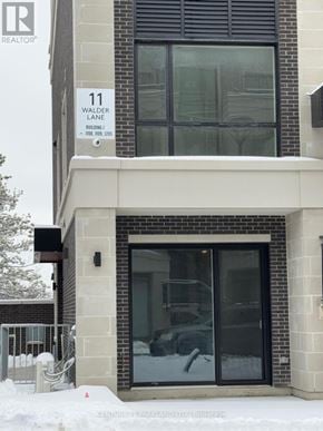 Richmond Hill (Devonsleigh) condo for rent - A building with a sign that says Walder Lane.