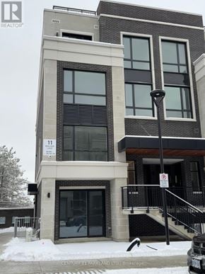Richmond Hill (Devonsleigh) condo for rent - A building with a sign that says 11 on it.