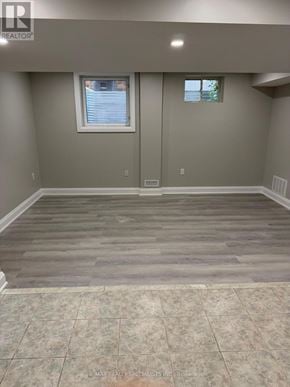 Brampton (Bram West) apartment for rent - A room with grey walls and a window with blinds.
