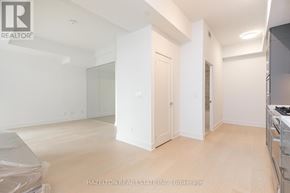 Toronto (Yonge-Eglinton) condo for rent - A white room with a door and a window.
