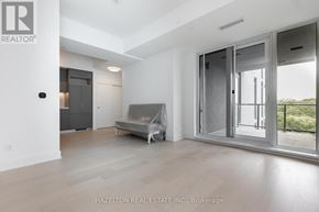 Toronto (Yonge-Eglinton) condo for rent - A spacious room with a couch and a bed in it.