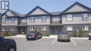 Niagara Falls (Ascot) house for rent - A building with the text RE/MAX Realty Specialists Inc. Brokerage in front of it.