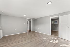 Chilliwack apartment for rent - A room with a white door and a grey wall.