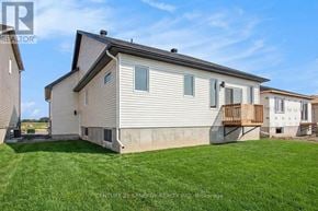 North Stormont multi-family for rent - A house with a lawn in front of it is for sale.