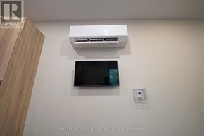 Toronto (Kensington-Chinatown) apartment for rent - A kitchen with a granite countertop and a stainless steel sink.