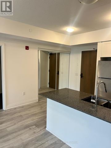 Markham (Greensborough) condo for rent - A kitchen area with a sink and a counter.