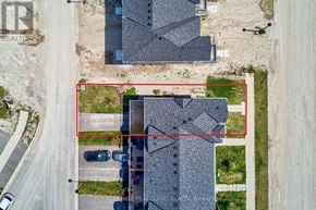 Wasaga Beach townhouse for rent - A bird's eye view of a residential area with a red line demarcating a boundary.