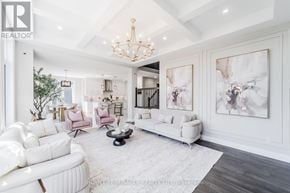 Woodstock (Woodstock - North) apartment for rent - A spacious living room with white furniture and a chandelier.