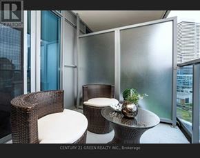 Mississauga (City Centre) condo for rent - A balcony with a table and two chairs.