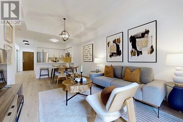 Vaughan (Lakeview Estates) condo for rent - A living room with a grey couch and a wooden coffee table.