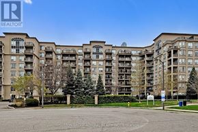 Vaughan (Lakeview Estates) condo for rent - A large apartment complex with a sign that reads "REALTOR" in the foreground.