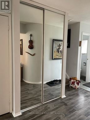 Richmond Hill (Observatory) townhouse for rent - A room with a grey floor and a white door.