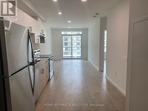 Guelph (Willow West/Sugarbush/West Acres) condo for rent - A kitchen with a refrigerator, stove, and oven.