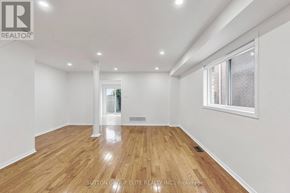 Mississauga (East Credit) apartment for rent - A kitchen with white cabinets and a tiled backsplash.
