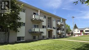 Kitchener multi-family for rent - A building with the words HOMELIFEMIRACLE FACTY LTD Brokerage on it.