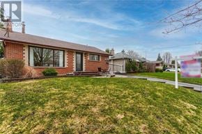 Oshawa (Mclaughlin) apartment for rent - A house with a lawn in front of it.