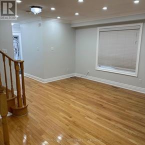 Brampton (Fletcher's Meadow) apartment for rent - A room with wooden flooring and a window with blinds.