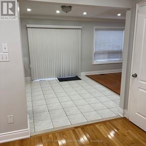 Brampton (Fletcher's Meadow) apartment for rent - A room with a white tile floor and a window with blinds.