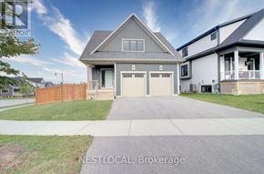 Blue Mountains apartment for rent - A house with a grey roof and a garage door is for sale.