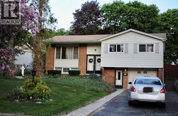 Waterloo apartment for rent - A house with a car parked in front.