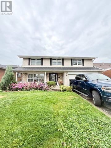 Mississauga (Applewood) apartment for rent - A blue truck is parked in front of a house.