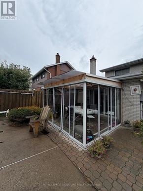 Mississauga (Applewood) apartment for rent - A backyard with a patio and a house.