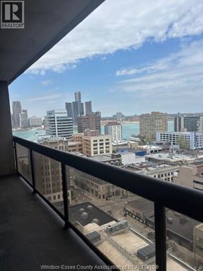 Windsor condo for rent - A view of a city from a high-rise building.