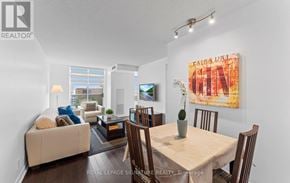 Toronto (Mount Pleasant West) condo for rent - A living room with a couch, a coffee table, a dining table and chairs.