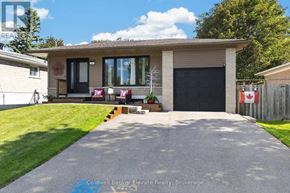 Halton Hills (Georgetown) apartment for rent - A house with a driveway in front of it.