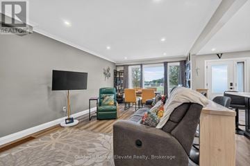 Halton Hills (Georgetown) apartment for rent - A living room with a grey couch and a flat screen TV.