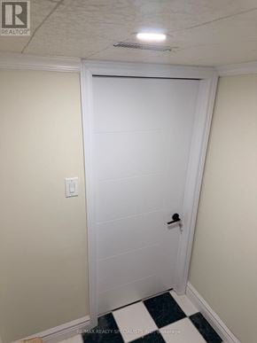 Mississauga (East Credit) apartment for rent - A white door with a black handle in a room.