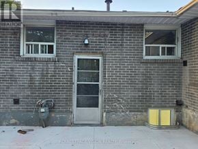 Pickering (West Shore) apartment for rent - A brick building with a door and windows.
