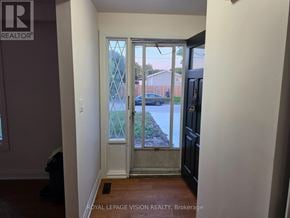 Pickering (West Shore) apartment for rent - A room with a door leading to a balcony.