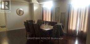 Brampton (Credit Valley) apartment for rent - A dining room with a table set for six with a view of the hallway.
