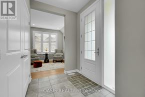 Ottawa apartment for rent - A living room with a couch, chair, and a rug.